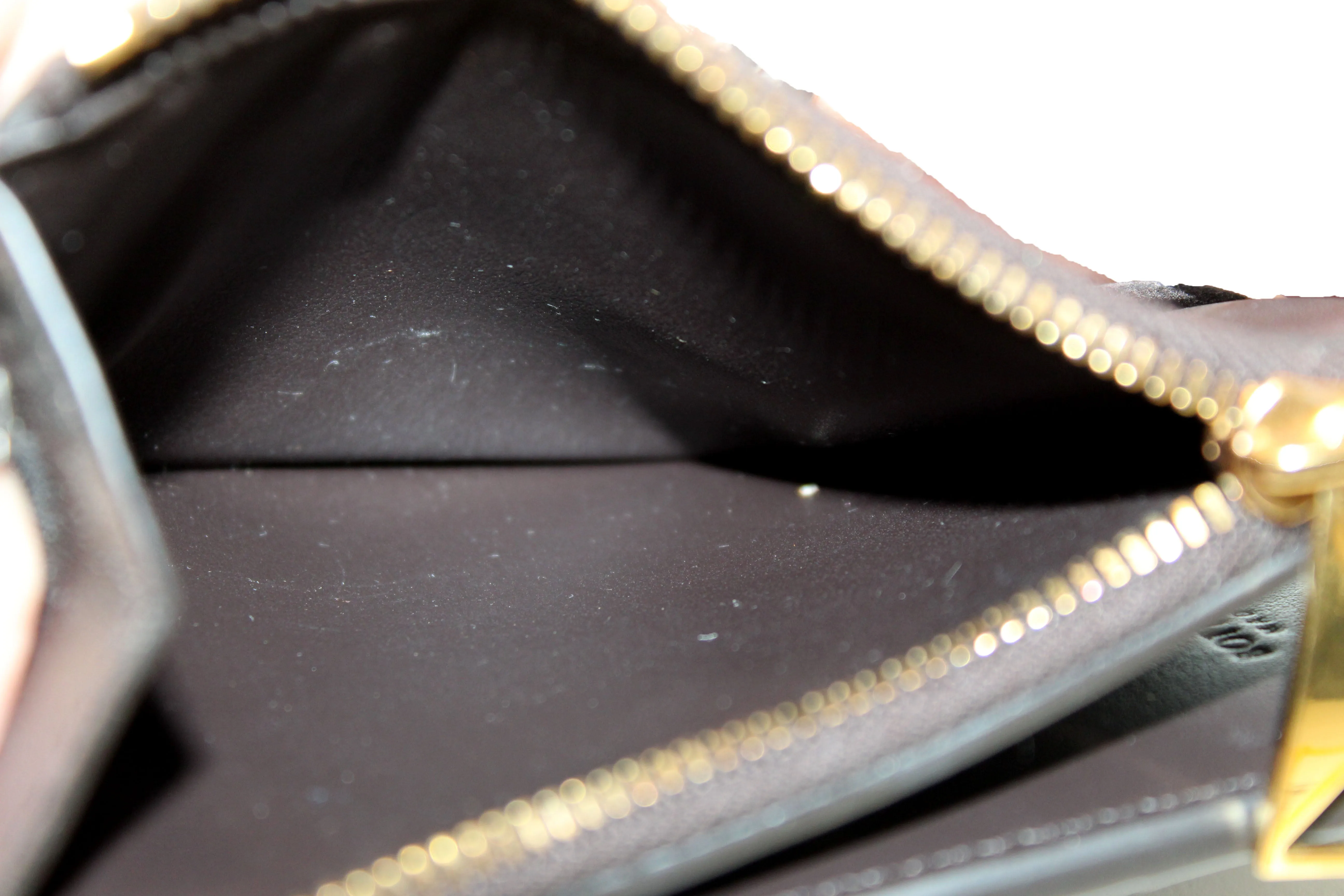 Authentic Bottega Veneta Brown Intreccio Leather Small Bi-Fold Zip Wallet