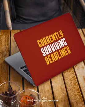 Funny Laptop Skin With The Text "Currently Surviving Deadlines"