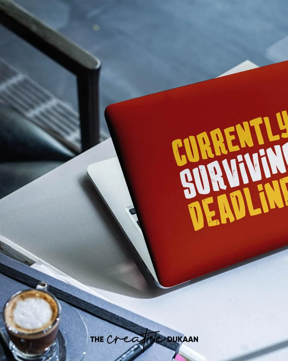 Funny Laptop Skin With The Text "Currently Surviving Deadlines"